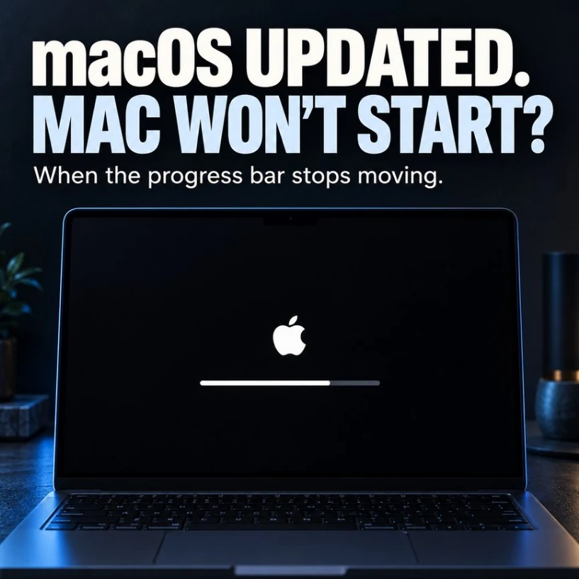 A MacBook showing the Apple logo and a stalled progress bar